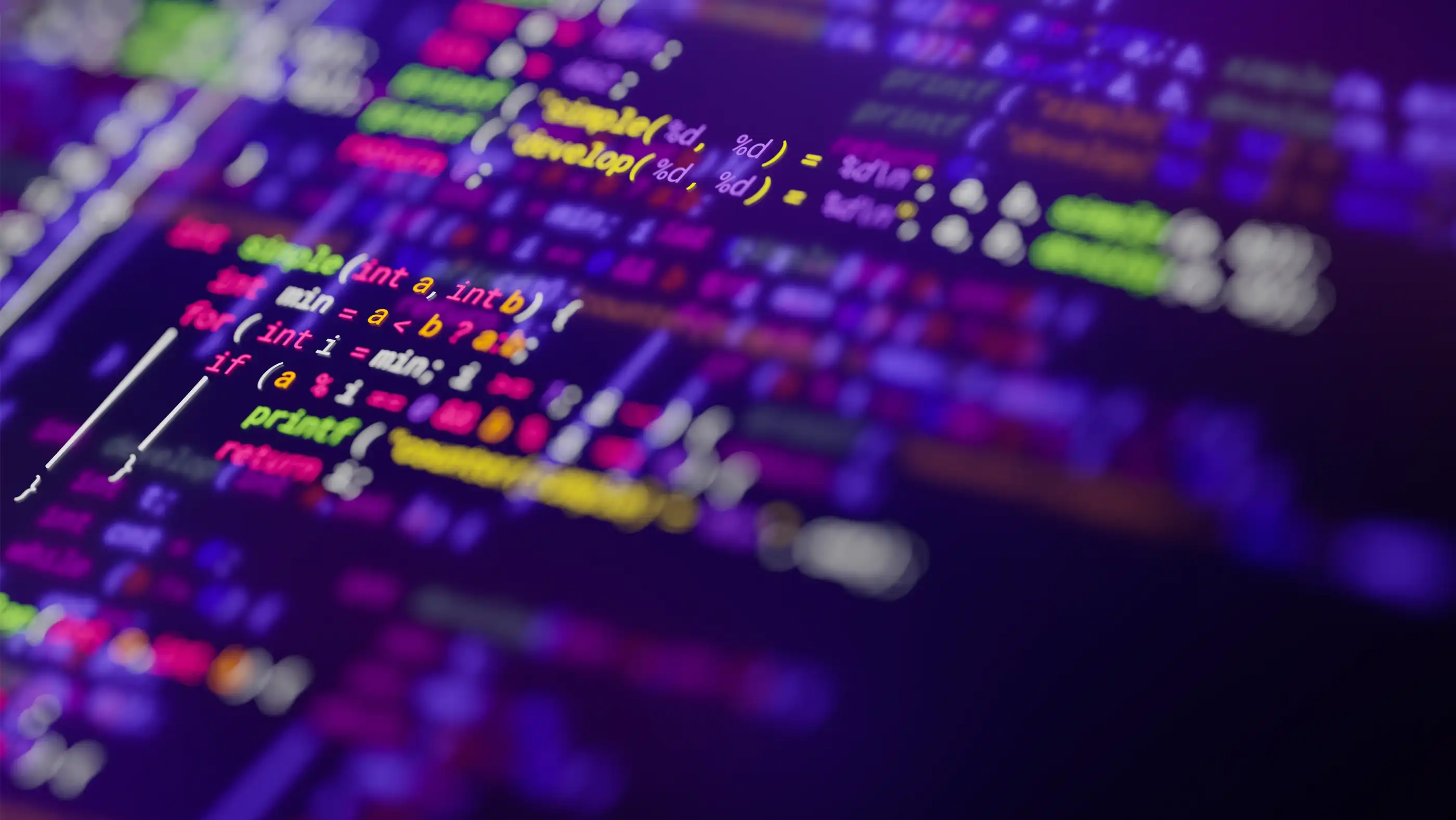 A screen displaying lines of blurred code, impossible to read.